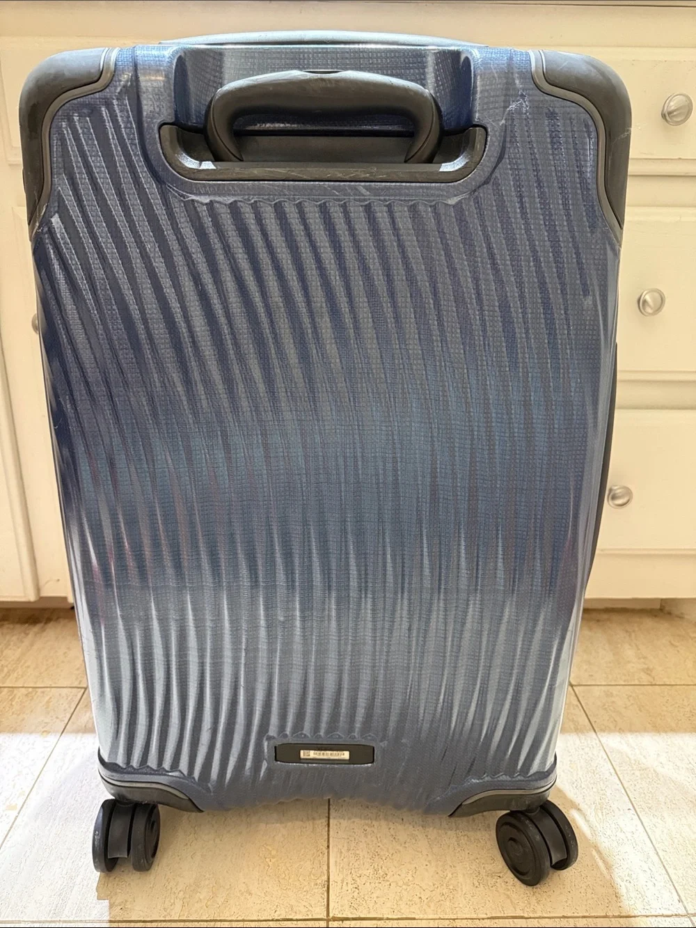 Tumi Navy Textured Hardshell Spinner Suitcase medium check bag